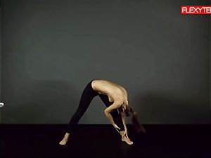 black-haired gymnast showcasing of her rump